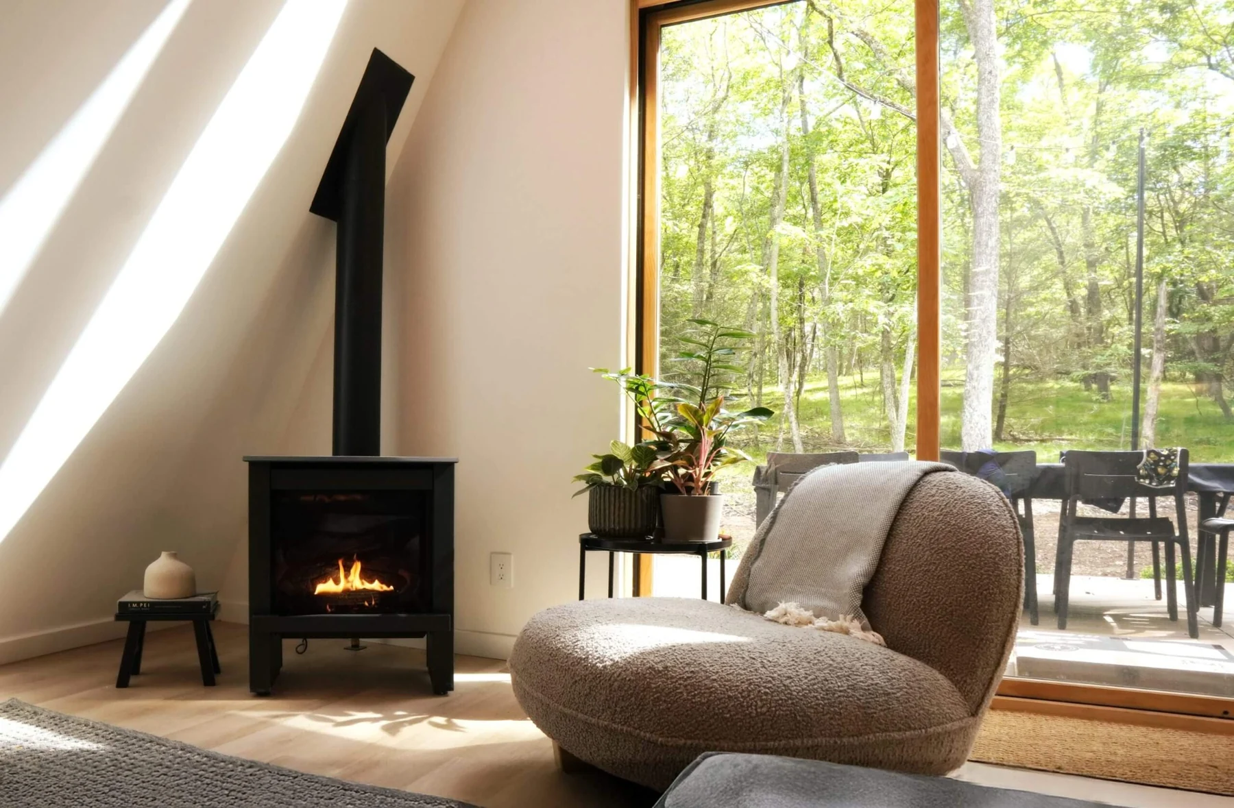 Mori A-Frame fireplace and forest views