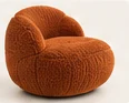Illustrative rust lounge chair